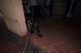 Asian latex slave exercised outside