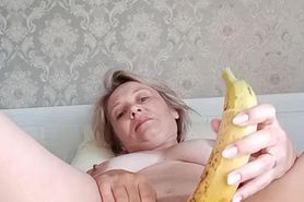 Queen Oksana masturbates with a banana