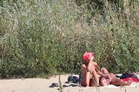 a wife wank cock on beach on video