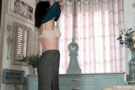 Erzsebet Sz elegantly strips naked and models on a chai