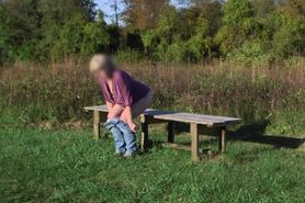 Trixie rubs one out on the park bench
